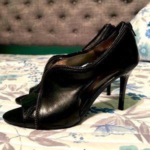 Carlos black 2 inch heels.  Slightly worn.  Size 8
